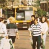 Bus and people on highstreet.